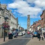 Ayr, Scotland, UK - August 29, 2018: Looking down High Street Ayr where most of the street has been pedestrianised in a bid to control traffic in the town centre.